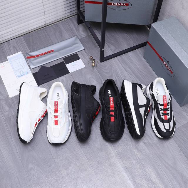 商品商标：Prada 普拉达 休闲鞋 正码码数 38-44 商品材料：精选 头层牛皮拼接透气鞋面 牛皮鞋垫 透气网内里 原版大底