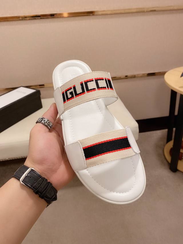 Gucci古奇拖鞋 男鞋高端品牌 官网1:1最新力作：原版开模定制，面料釆用进口原版材料制作，升级版大底，更轻便，防滑。市场顶级品质，简单不失品味，潮人必备，时