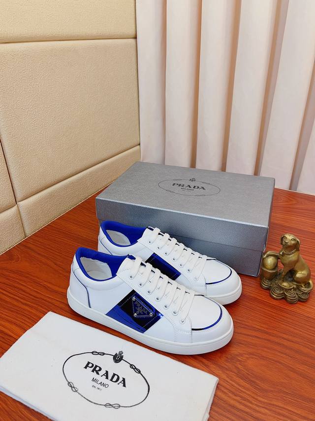 实价： Prada 普拉达 顶级原单size：38-44Linea Rossa运动系列男鞋，鞋面：原厂进口头层牛皮搭配真皮内里耐磨橡胶大底， 上脚舒适！