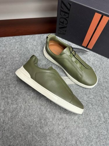实价 。Zegna2024Ss新款爆款杰尼亚休闲运动鞋 Triple Stitch 是一款精致的休闲鞋履，饰有标志性三重交叉松紧细节，灵感源于三重手缝线迹造型