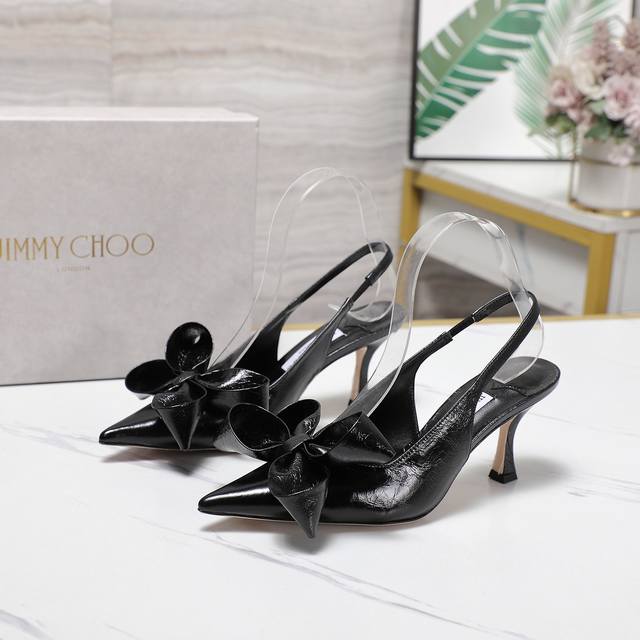 jimmy Choo 周仰杰 Staz尖头蝴蝶结穆勒高跟鞋 staz Sling Back 70系列露跟高跟鞋，采用皮革材质打造别致优雅鞋型，搭配精美蝴蝶结和立