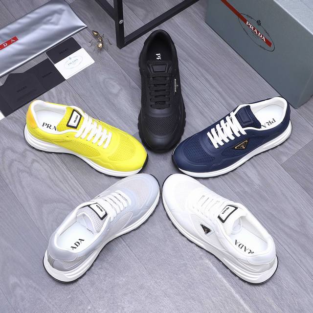 商品商标：Prada 普拉达 休闲系带男鞋 正码码数: 38-44 商品材料：精选 头层优质牛皮拼接网面 皮内里 原版大底