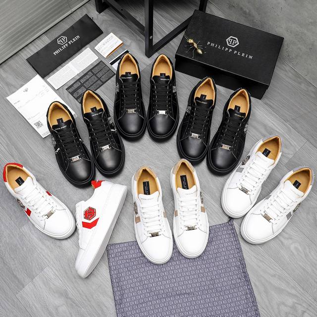 商品商标：Philipp Plein 菲利普-普莱茵 休闲鞋 正码码数: 39-45 38订做不退換 商品材料：精选 牛皮拼接鞋面 金属Logo装饰 牛皮内里