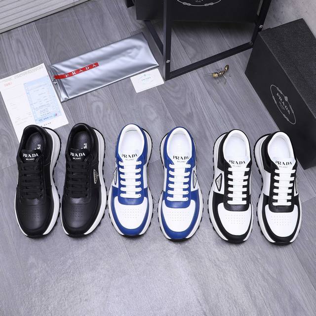 商品商标：Prada 普拉达 休闲系带男鞋 正码码数: 38-44 商品材料：精选 头层优质牛皮拼接鞋面 羊皮内里 橡胶大底