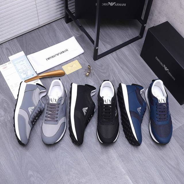 商品商标：Armani 阿玛尼 休闲鞋 正码码数: 38-45 商品材料：精选牛皮拼接透气鞋面 网内里 原版大底