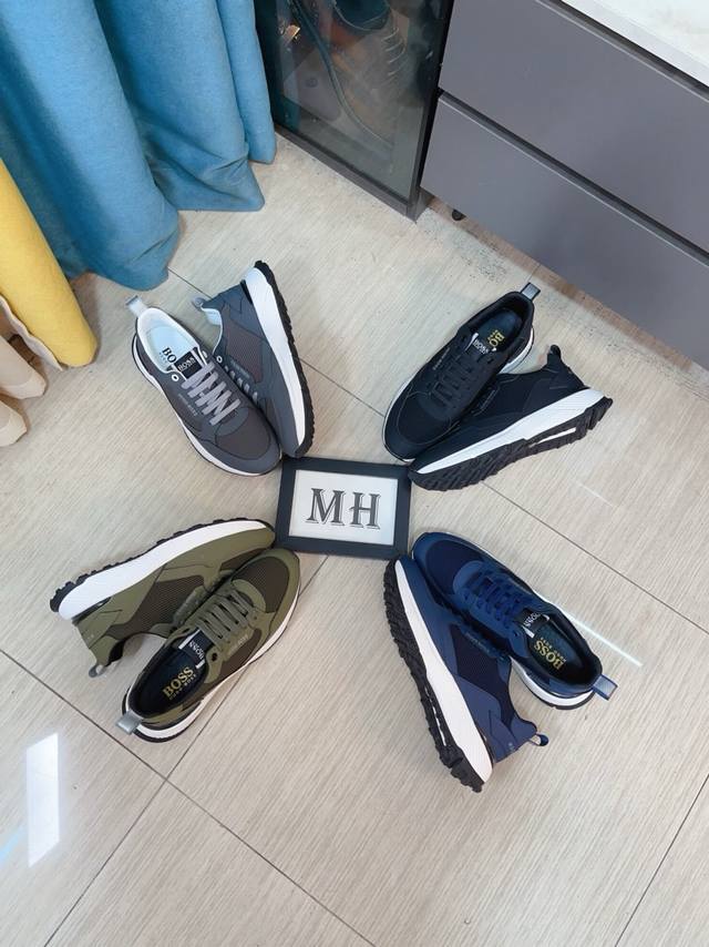 出厂价p Boss 以经典的设计成为永不落幕的时尚宠儿，经典的休闲造型。鞋面采用顶级反绒皮搭配防水布 品牌Logo点缀 彰显品牌魅力；头层真皮里 品牌专用大底，