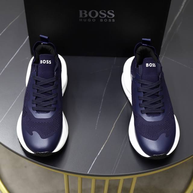 出厂价pp： 品牌：Boss 标准码：39-44 45、46订做 等级：官网同款 材料：原厂牛皮材料拼接 舒适透气内里 轻便耐磨运动大底 款式类别：男士时尚休闲