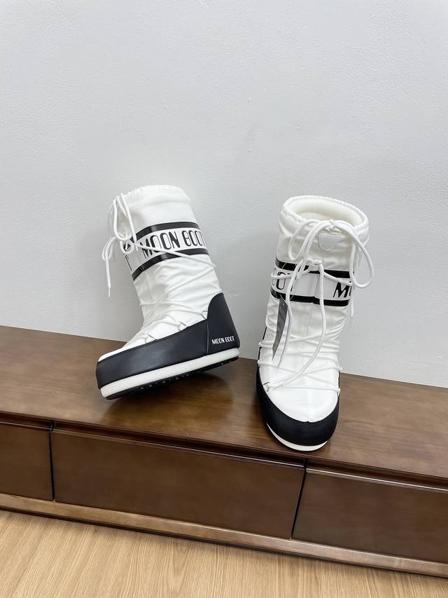 布面高靴 顶级版本moon Boot Vs秋冬最新款复古雪地靴 时髦人都在穿moon Boot雪地靴如果你难以接受ugg的复兴那现在有一款更另类的雪地靴又杀回来