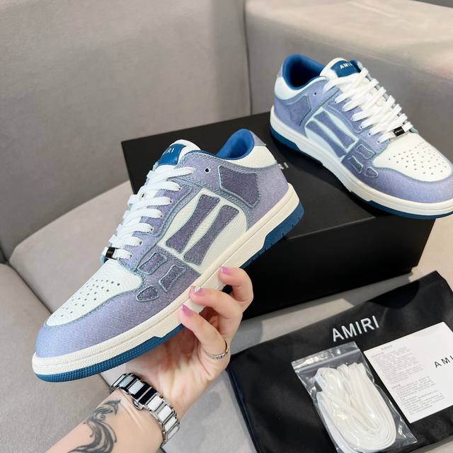 Amiri骨头鞋情侣款，日常休闲必备单品，情侣鞋。适合各种场合！Amiri骨头鞋凭借鞋侧颇具独到风格的骨头图案，充满酷感又百搭！杨幂，陈伟霆等超多明星出席节目或