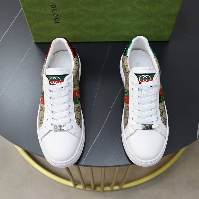 商品商标：Gucci 古奇 休闲鞋正码码数: 38-44 45定制商品材料: 男士经典古奇休闲鞋，原单品质鞋面采用意大利进口原厂材料羊皮内里，做工精细，高端大气